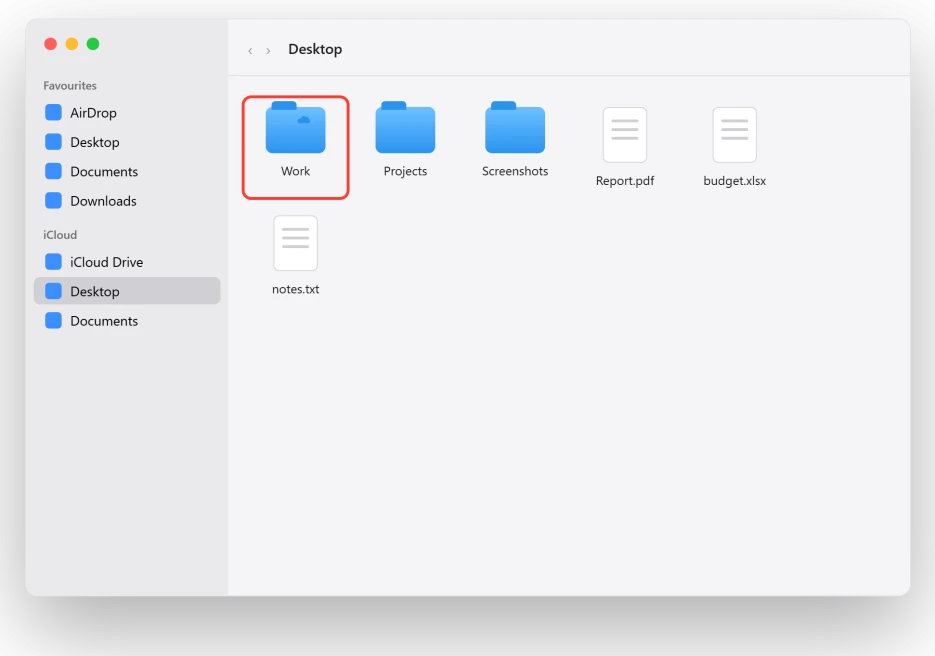 iCloud Drive Desktop folder in Finder, with a folder still syncing down from iCloud