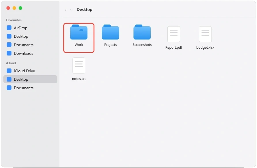 iCloud Drive Desktop folder in Finder, with a folder still syncing down from iCloud