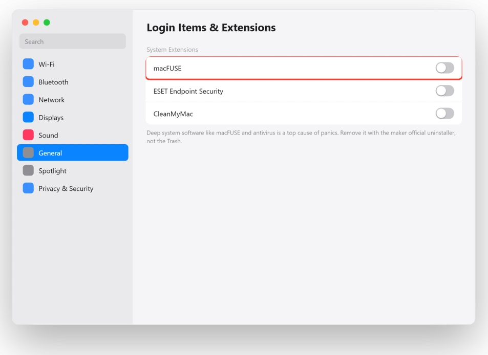 macOS Login Items and Extensions settings showing system extensions to remove