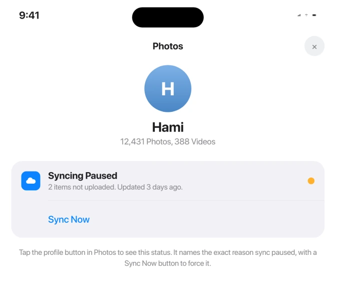 iCloud Photos library status and Resume control in the Photos app
