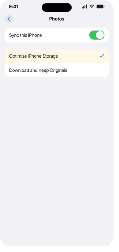 The iCloud Photos screen in iOS 26 Settings with Sync this iPhone on and Optimize iPhone Storage selected instead of Download and Keep Originals
