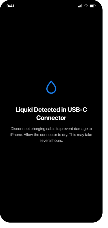 The Liquid Detected in USB-C Connector alert, showing Apple's wording