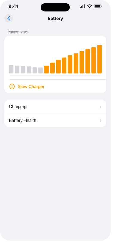 Settings, Battery, showing the orange Slow Charger row and its information button under the charging graph