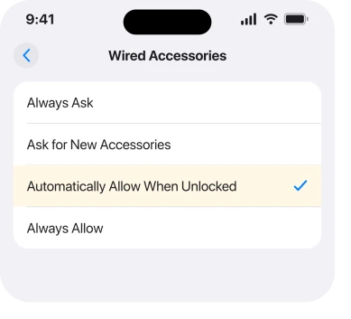 The Wired Accessories screen on a USB-C iPhone, showing Automatically Allow When Unlocked selected, which is the default Apple names. If yours shows Always Ask instead, that is the setting to look at
