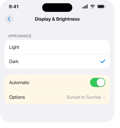 Display & Brightness, with Automatic on and Sunset to Sunrise selected under Options