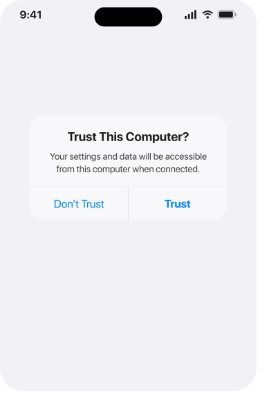 The Trust This Computer alert on an iPhone