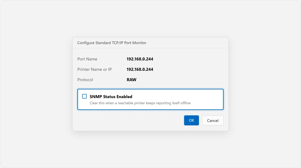 The port configuration dialog with SNMP Status Enabled
